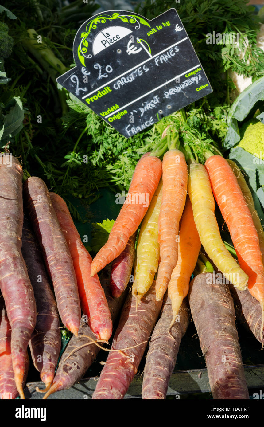 Bunched heritage carrots / carottes fanes Stock Photo