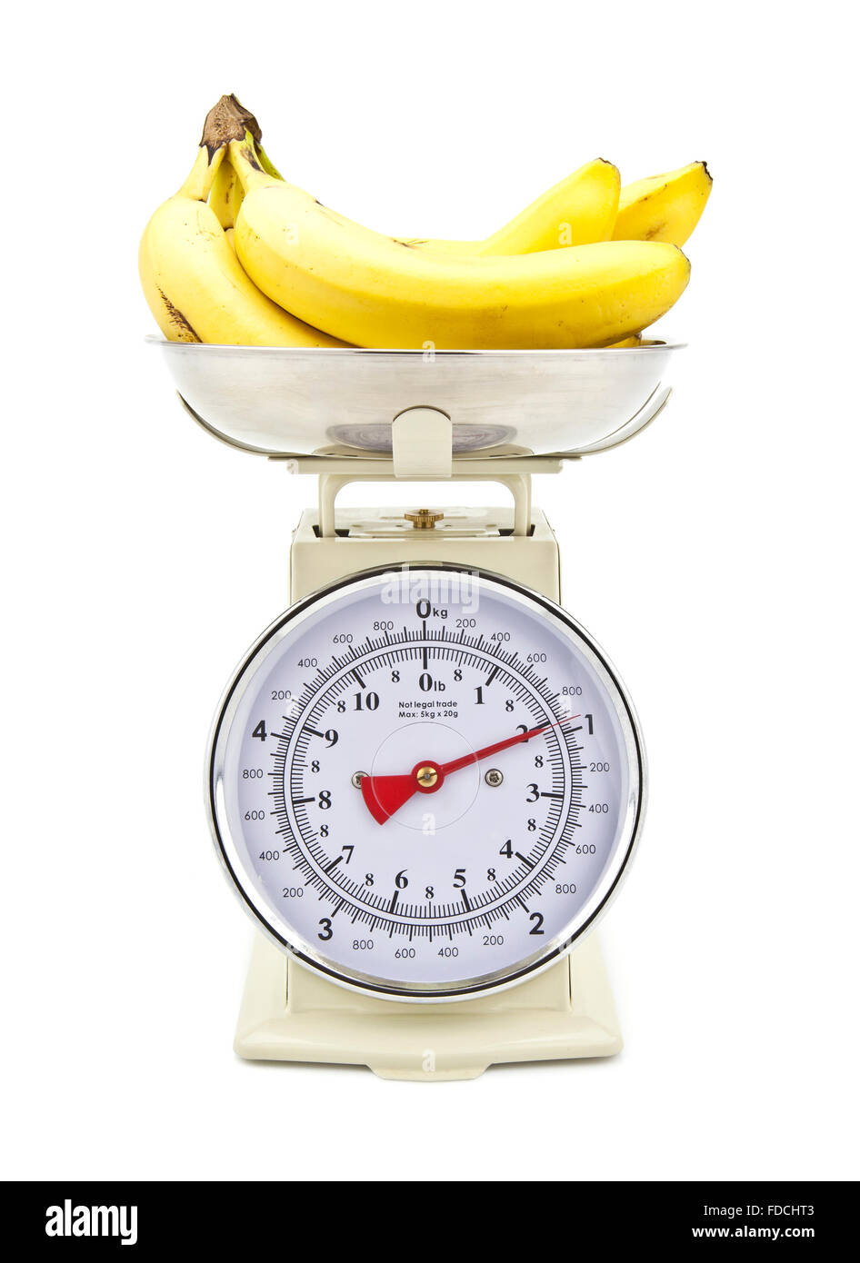 Old style kitchen scales with Bananas on white background Isolated Stock Photo