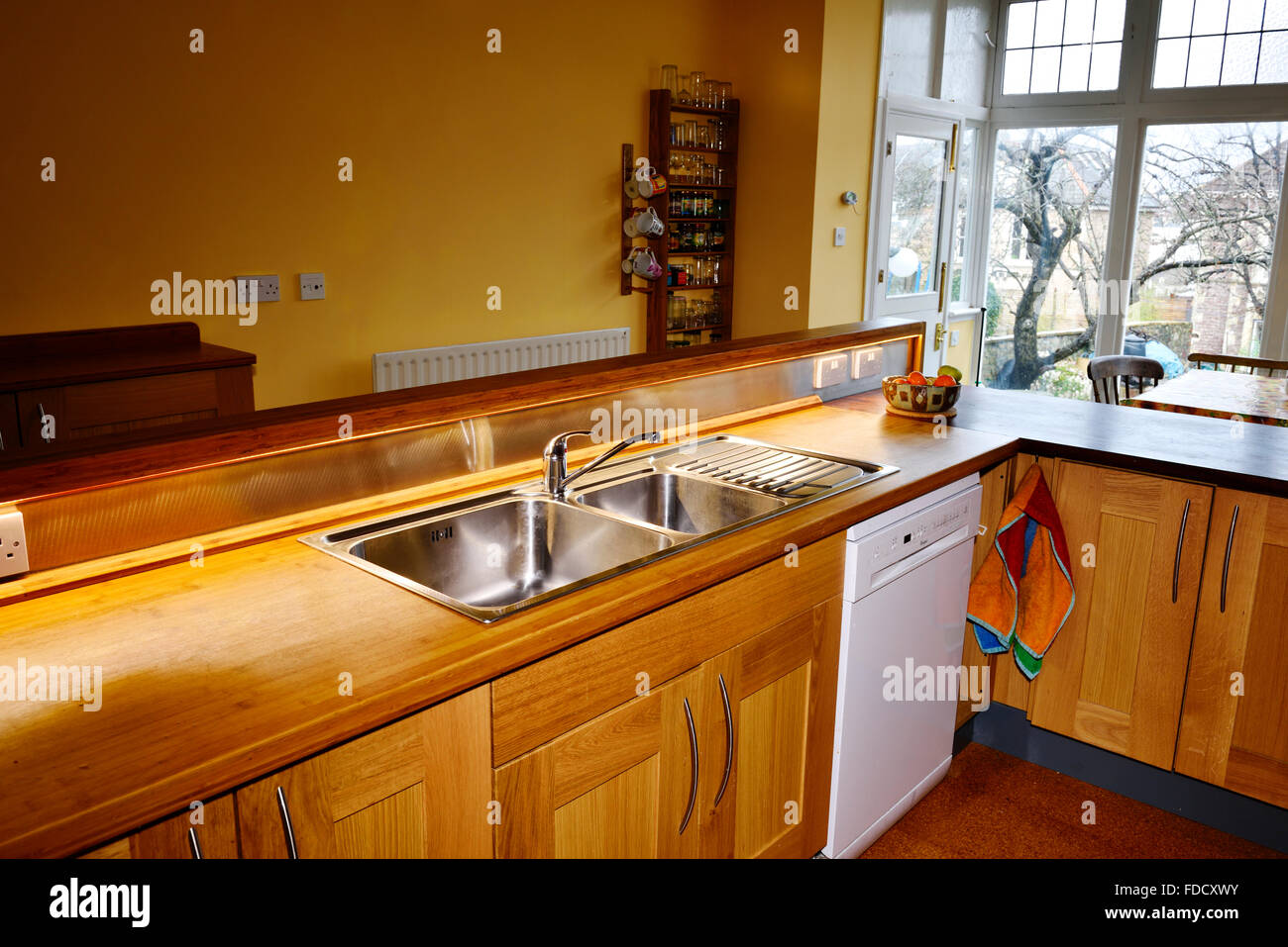 Kitchen With Stainless Steel Sink In Bamboo Counter Top England