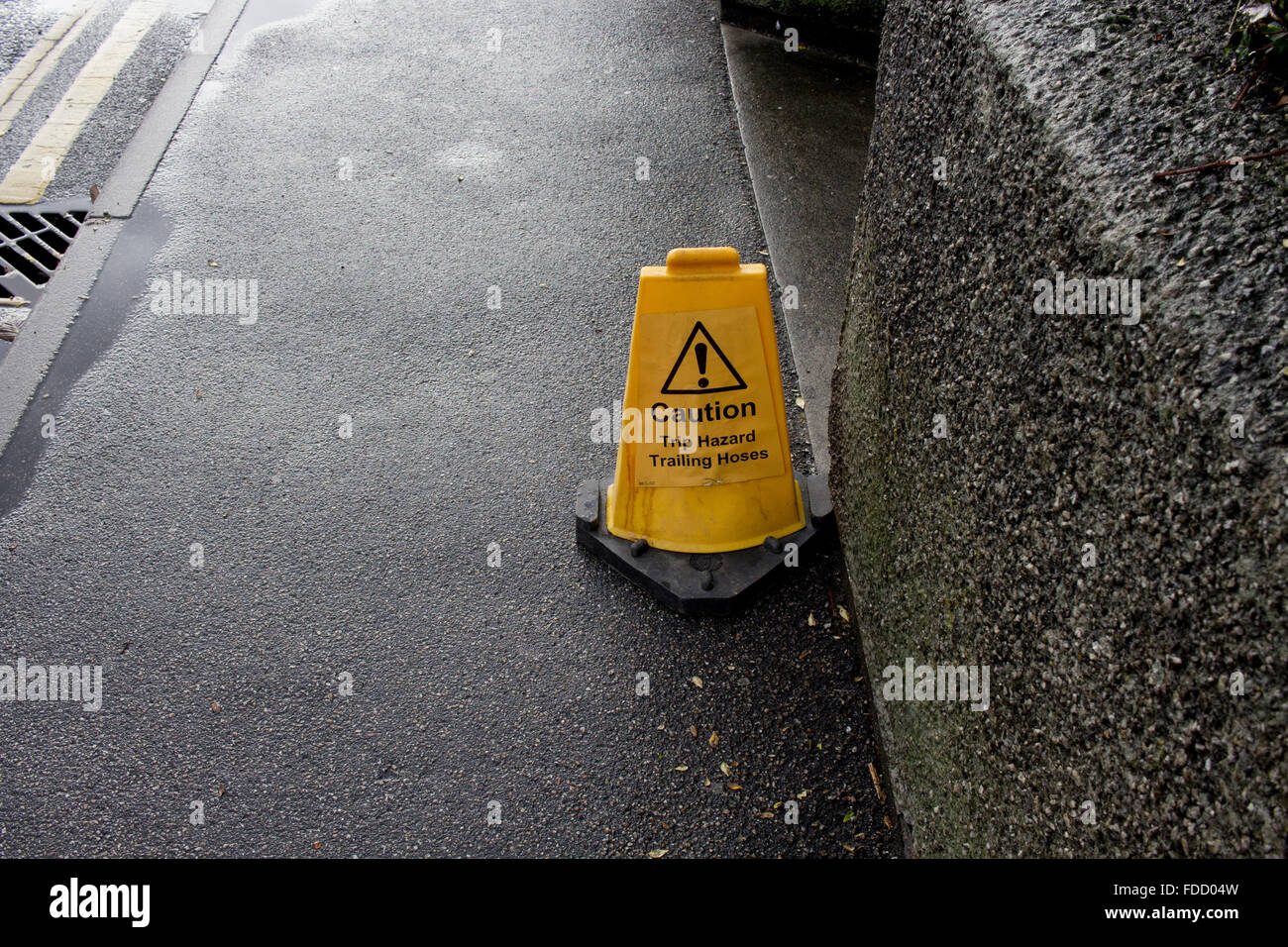 Caution Trip Hazard, Trailing Hoses Stock Photo Alamy