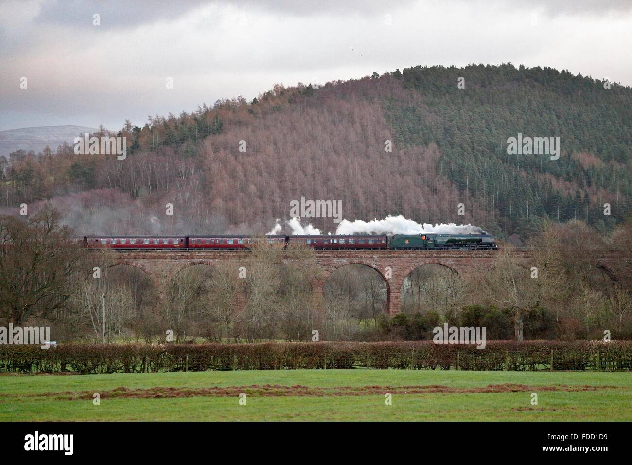 Cumbria, UK. 30th Jan, 2016. Armathwaite Viaduct, Settle to Carlisle Railway Line UK. Steam train LMS Princess Coronation Class 46233 'Duchess of Sutherland'. The Winter Cumbrian Mountain Express. Crossing Armathwaite Viaduct at this time running 79 minutes late at this time due to poor quality coal. Credit:  Andrew Findlay/Alamy Live News Stock Photo