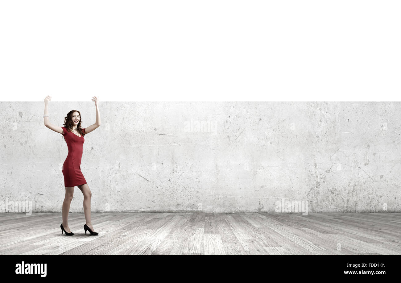 Pretty woman in red dress with white blank banner Stock Photo - Alamy