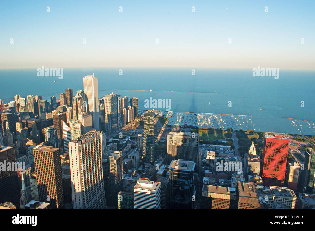 Chicago, Illinois, United States of America: skyline at sunset seen through the glass of the Willis Tower observation deck Stock Photo