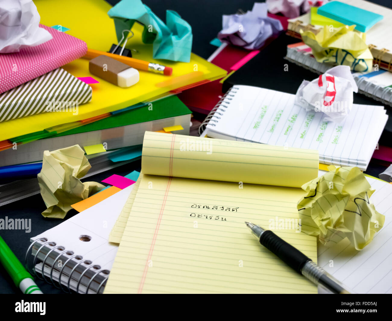 Learning New Language Writing Words Many Times on the Notebook; Thai Stock Photo