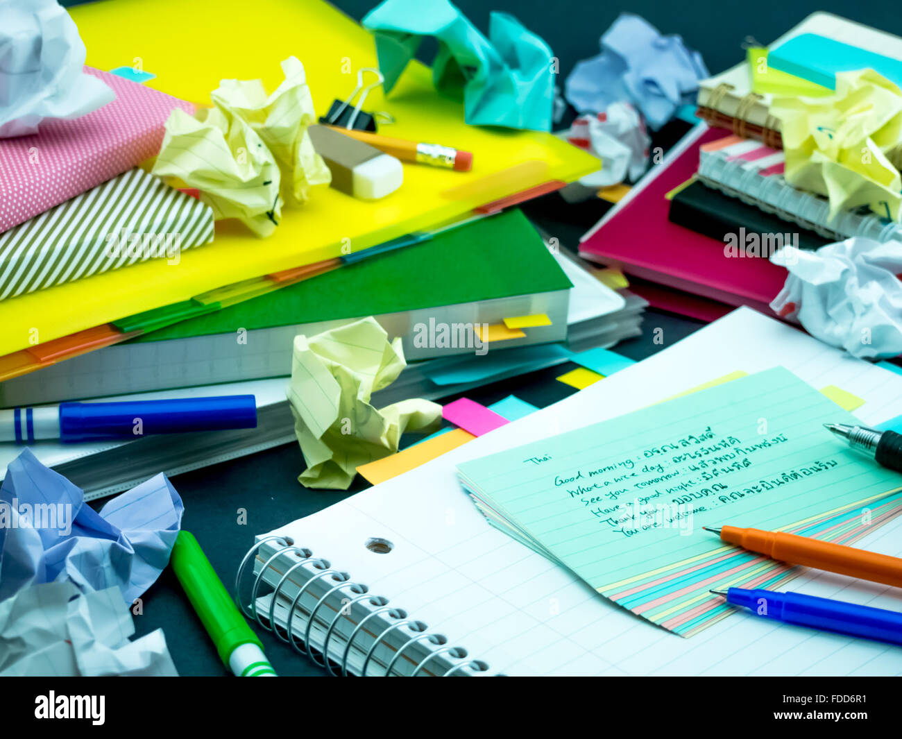 Learning New Language Writing Words Many Times on the Notebook; Thai Stock Photo