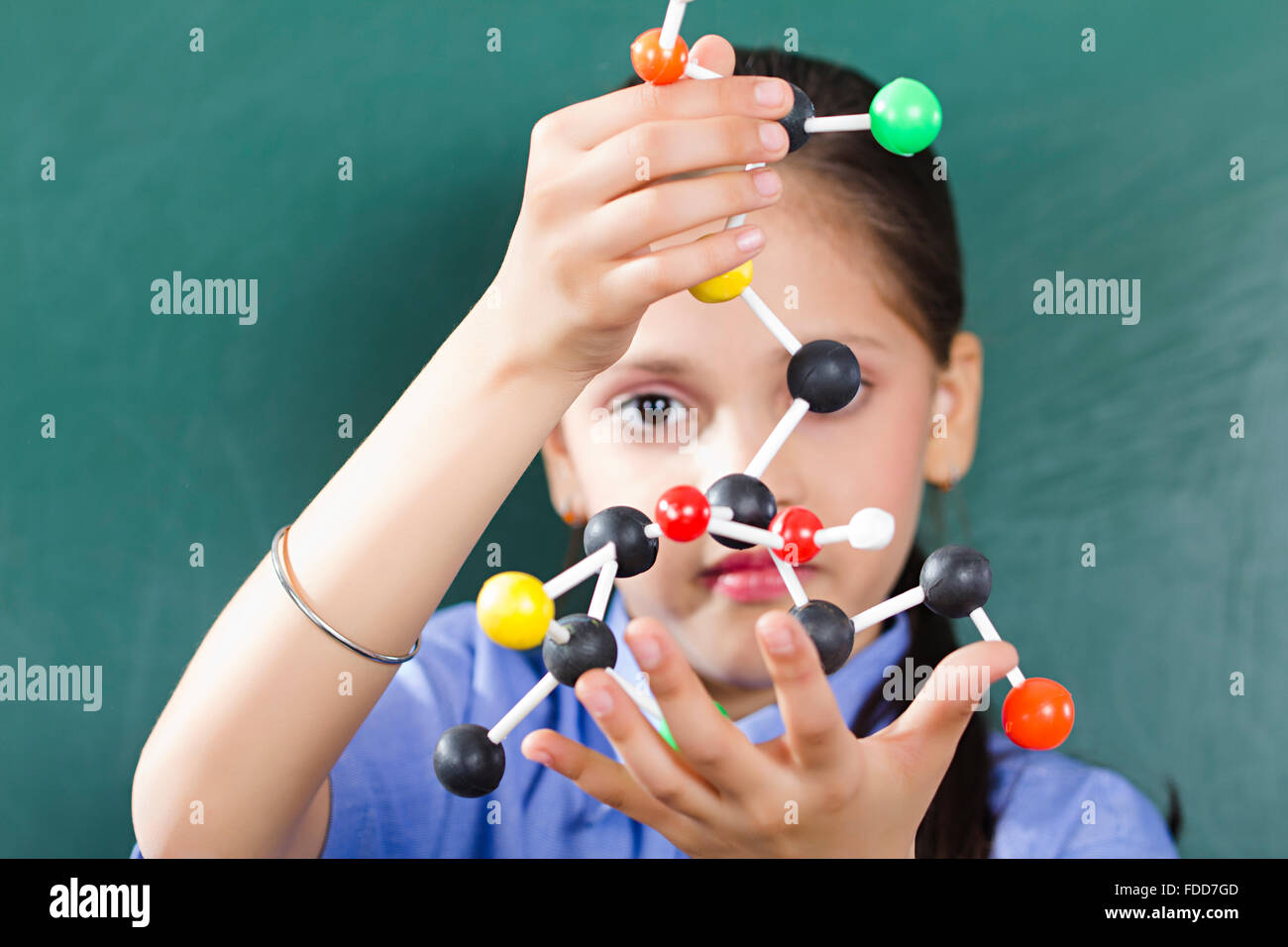 Holding close up curiosity concentration research hires stock