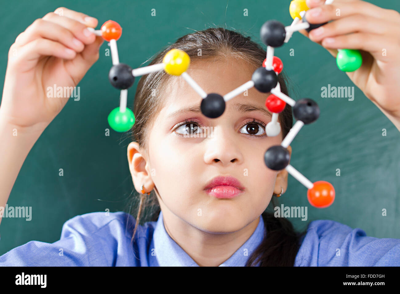 Holding close up curiosity concentration research hires stock