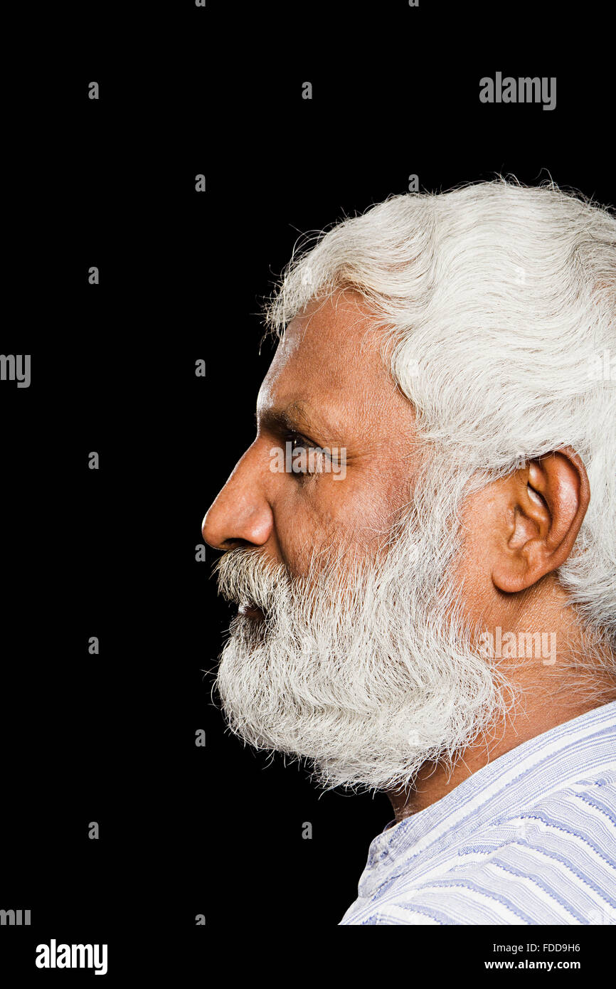 Elegant man posing while looking down to side Stock Photo by ©feedough  195599578