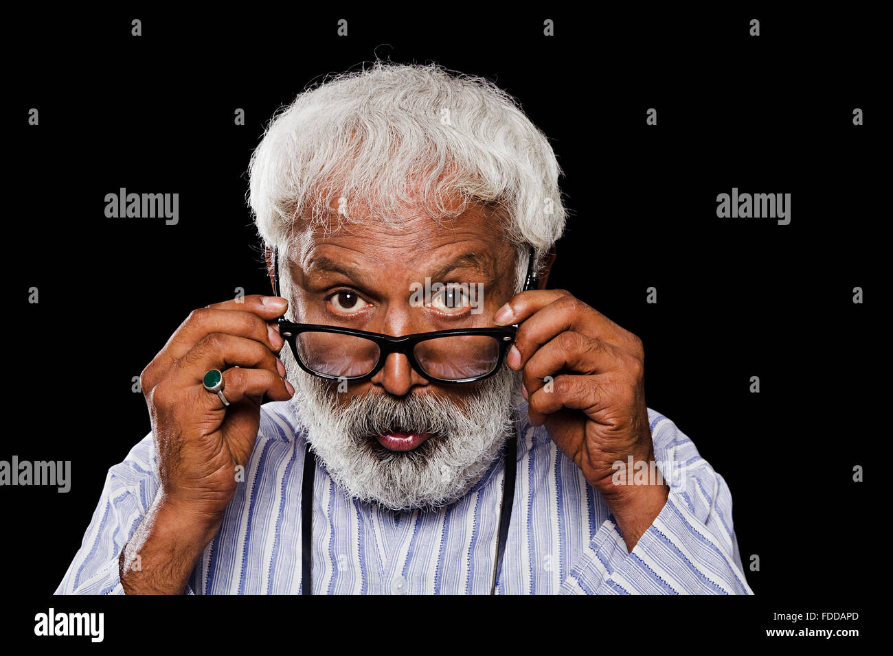 1 indian Senior Adult Man spectacles watching Stock Photo