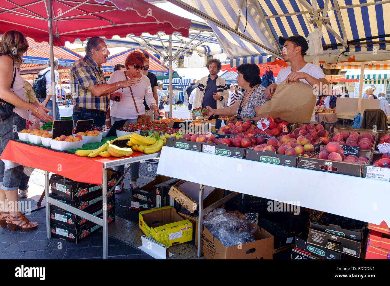 people shopping fruit street market stall france Stock Photo