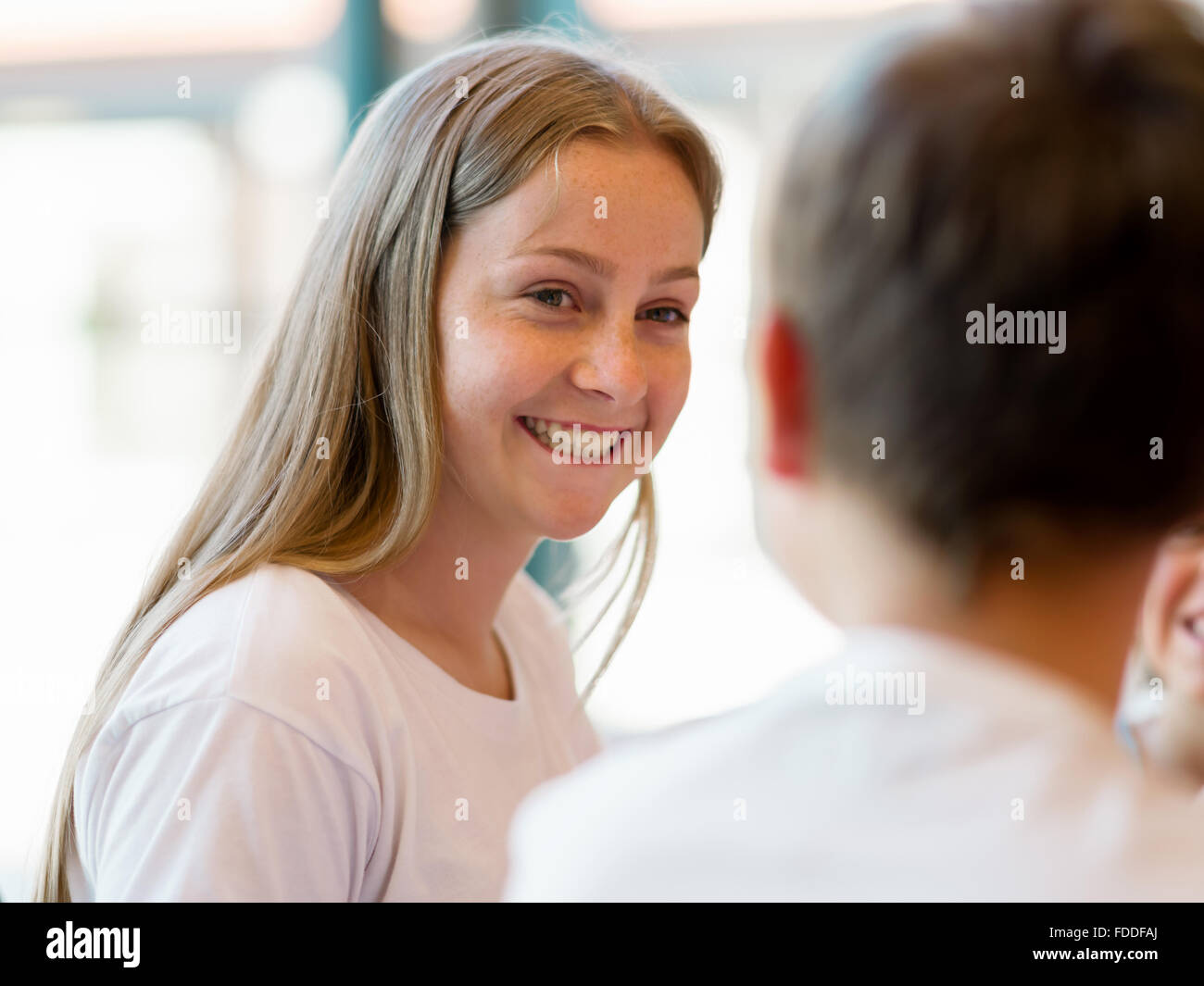 Portrait of a happy girl indoors Stock Photo - Alamy