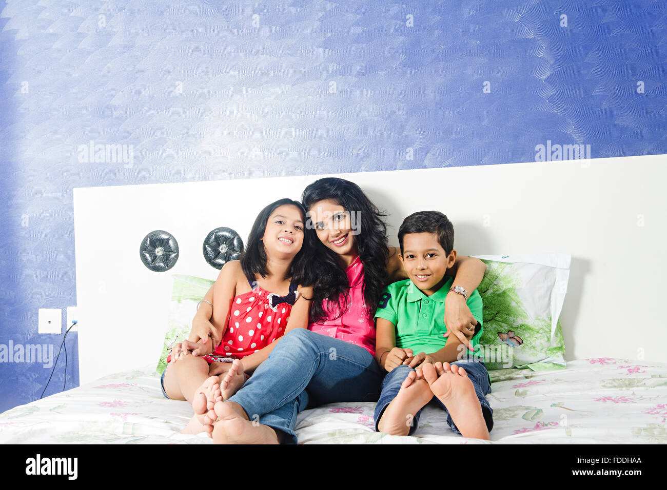 3 people mother and kids daughter and son sitting Relaxation Stock Photo