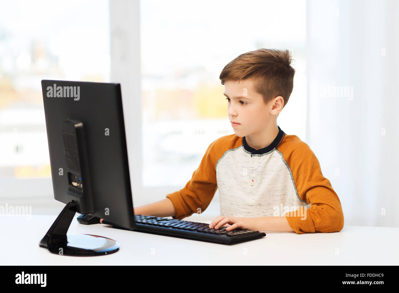 boy with computer at home Stock Photo - Alamy