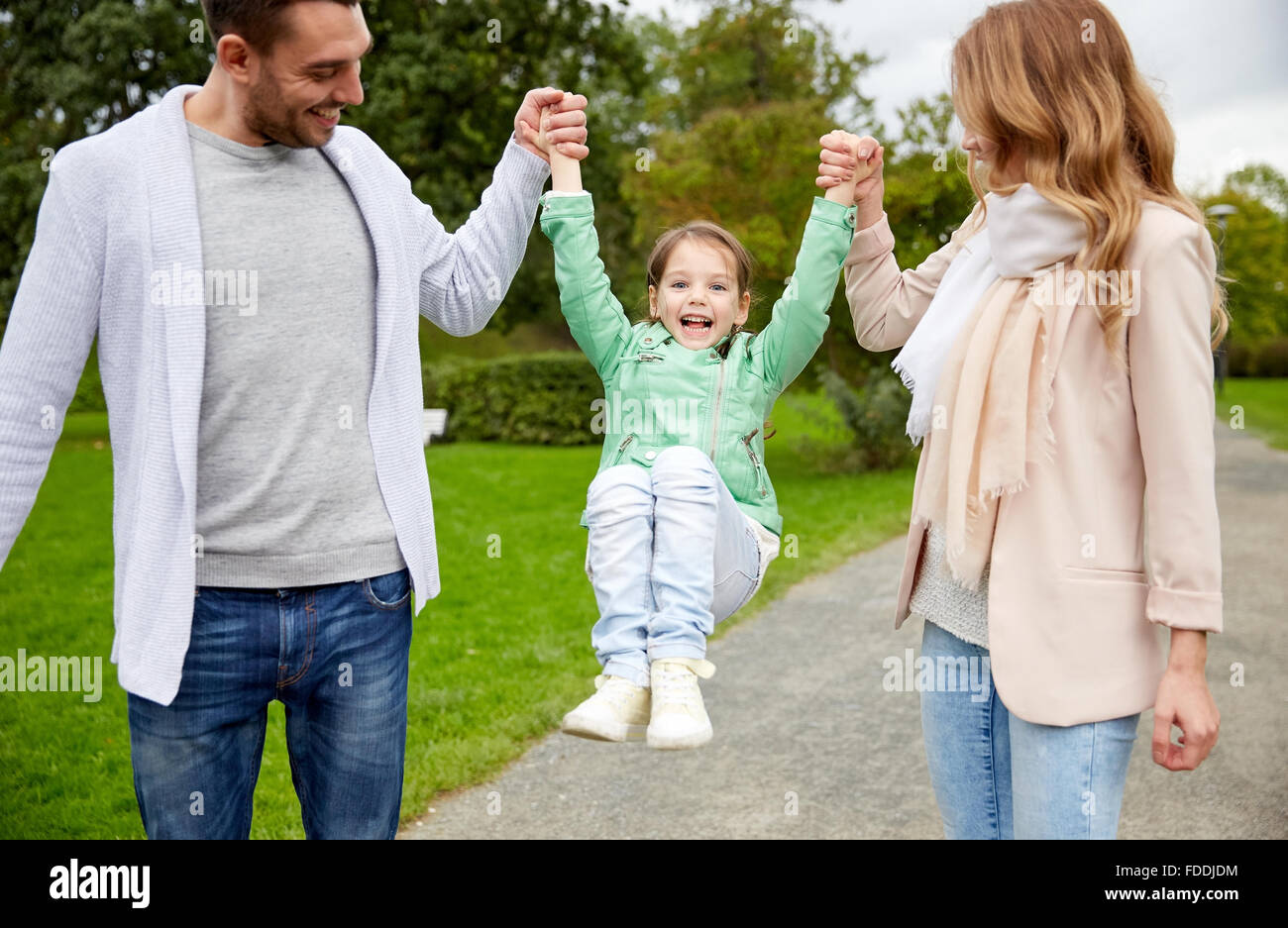 happy family walking in summer park and having fun Stock Photo - Alamy