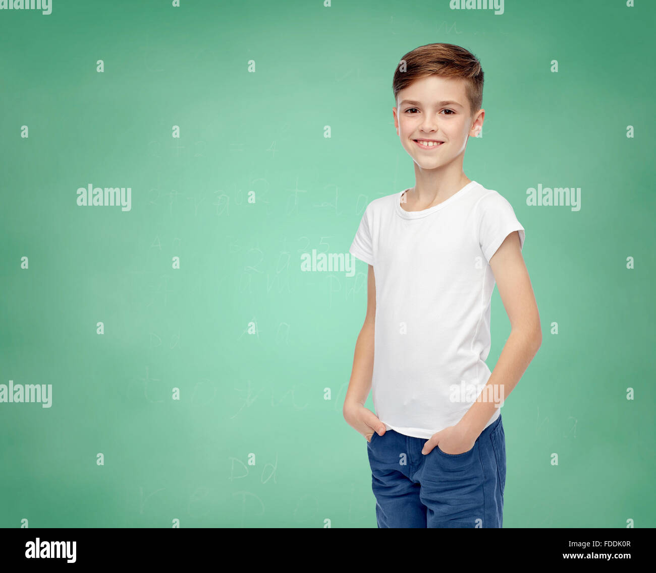 happy boy in white tshirt and jeans Stock Photo Alamy