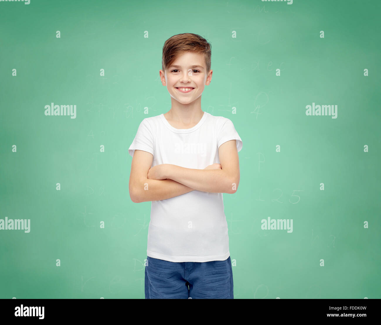 happy boy in white tshirt and jeans Stock Photo Alamy