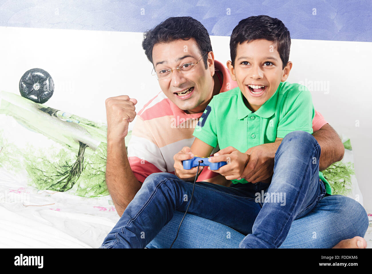 2 People Father and Kid Son Sitting Bedroom Playing Video Game Victory Stock Photo