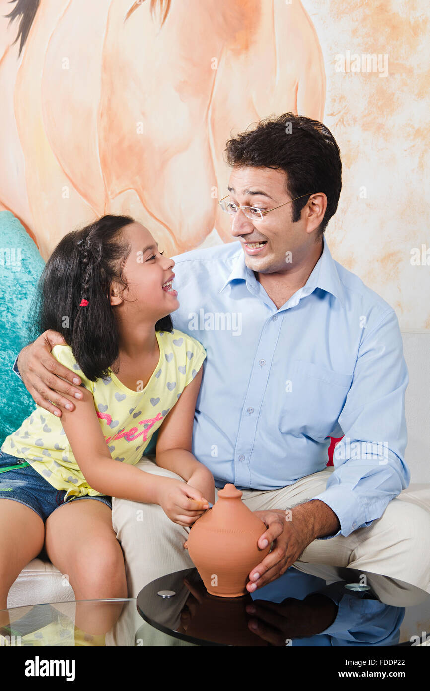 2 People Father and Kid Daughter Piggy Bank Inserting Coin Saving Money ...