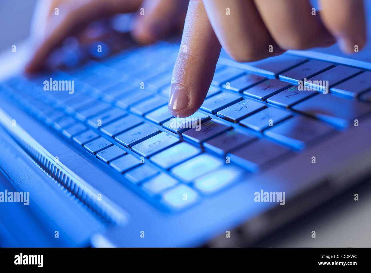 Hand Click/keyboard Click! Hands of a man on a keyboard with blue backlighting Stock Photo ...