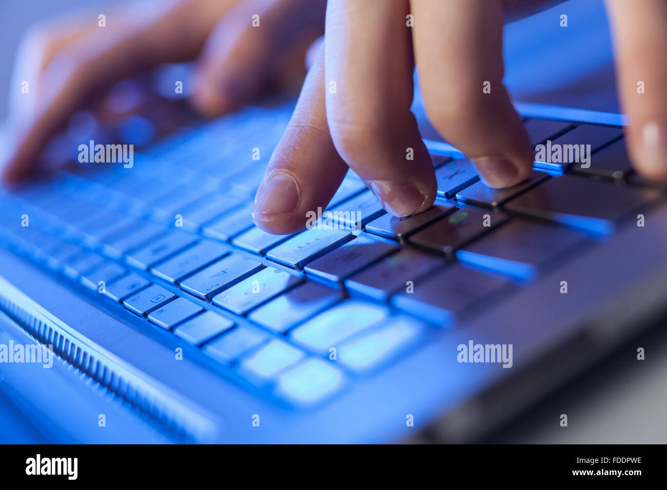 Hand Click/keyboard Click! Hands of a man on a keyboard with blue backlighting Stock Photo ...