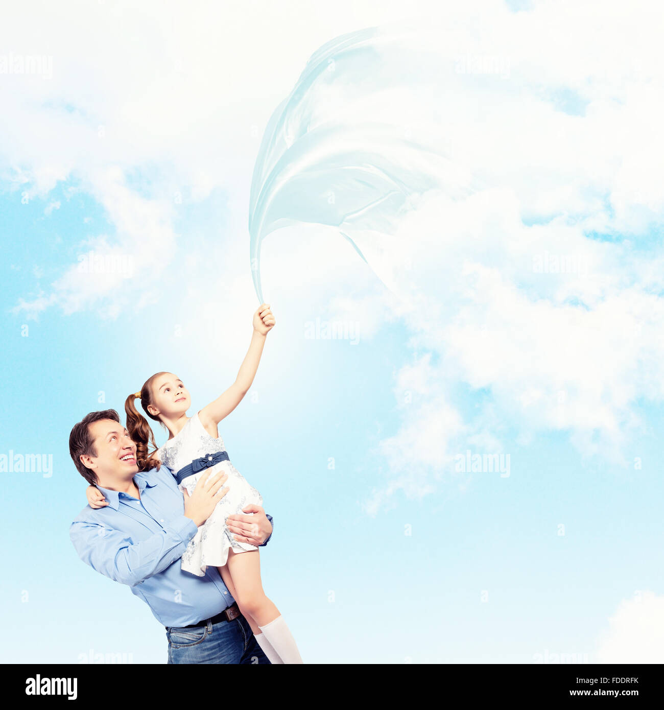Image of happy father holding on hands daughter Stock Photo - Alamy