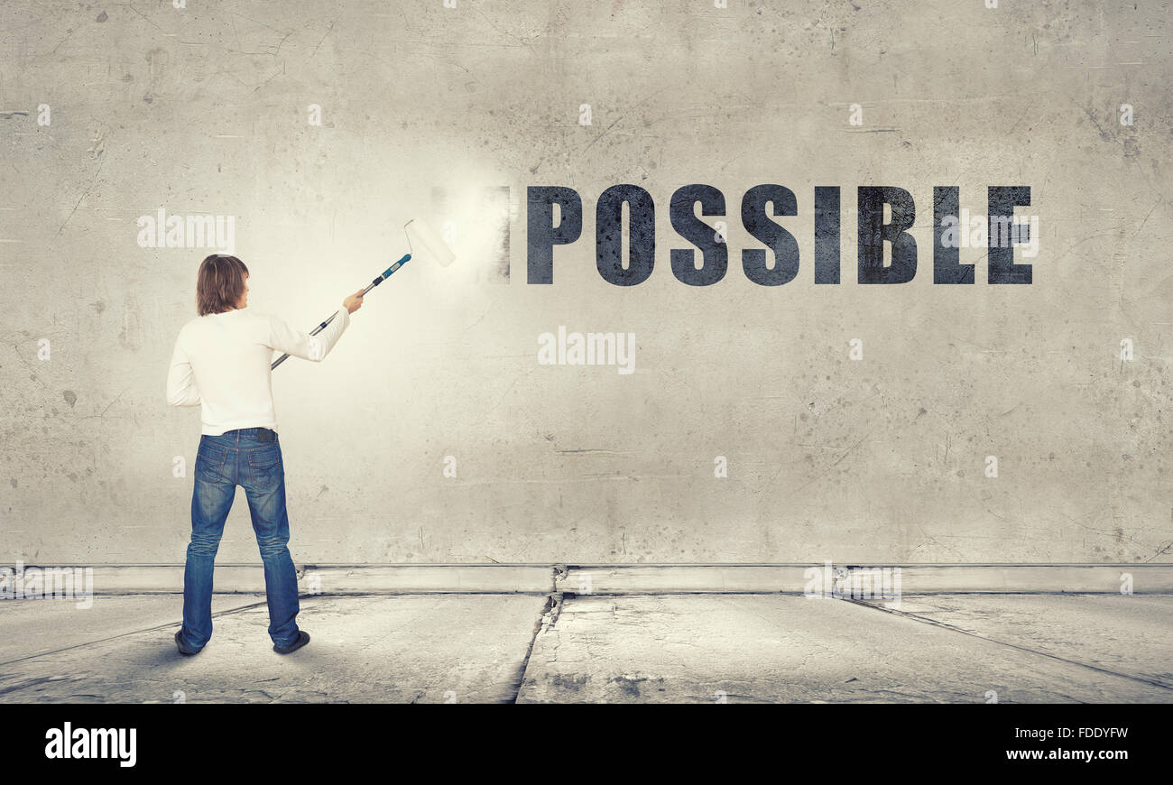 Businessman erasing impossible word hi-res stock photography and images ...