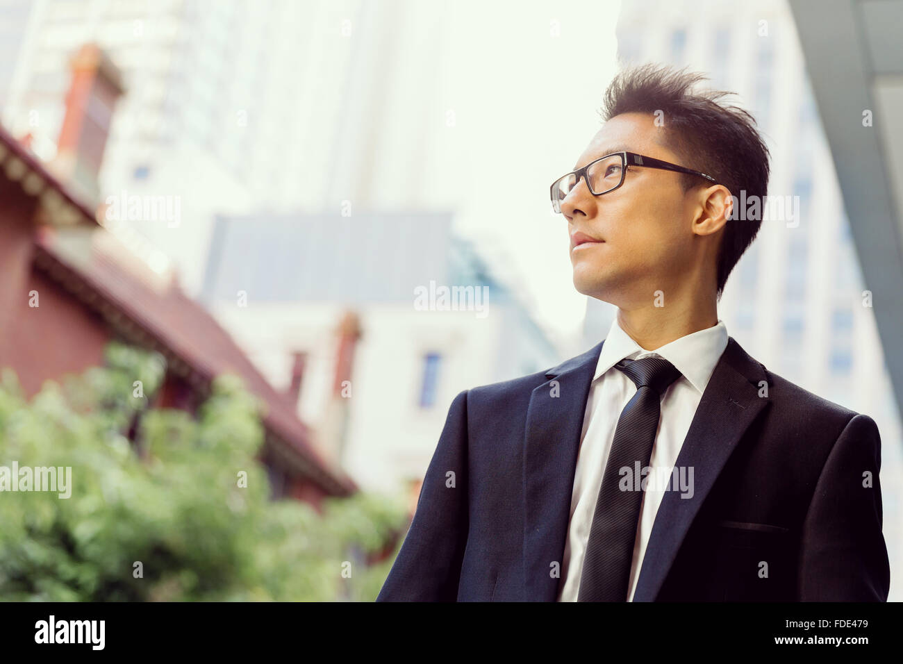 Businessman outdoors in city business district Stock Photo - Alamy