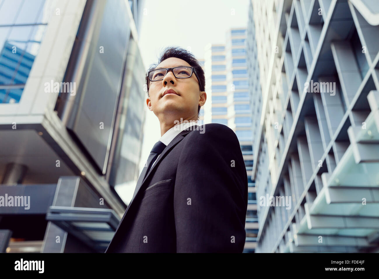 Businessman outdoors in city business district Stock Photo - Alamy