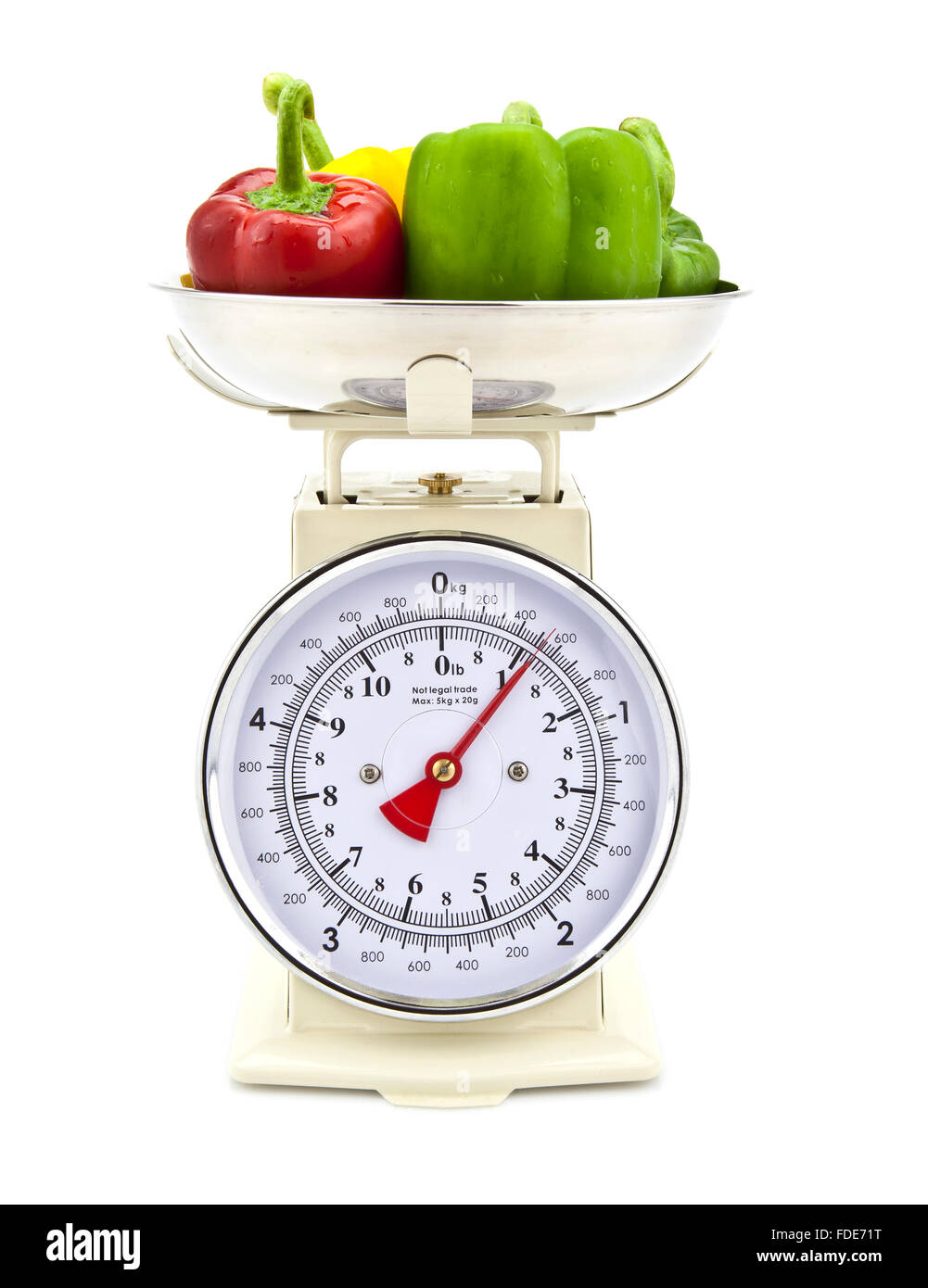 Old style kitchen scales with Pepper on white background Isolated Stock Photo