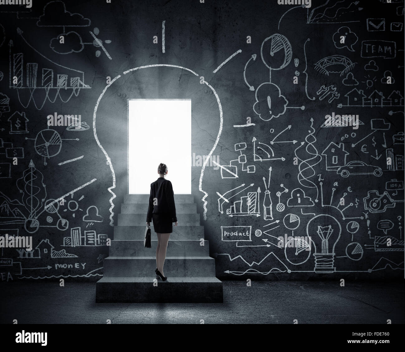 Rear view of businesswoman looking at opened door Stock Photo - Alamy