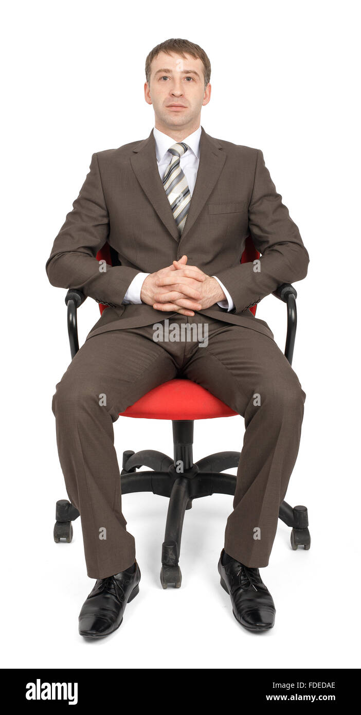 Businessman sitting on chair Stock Photo - Alamy