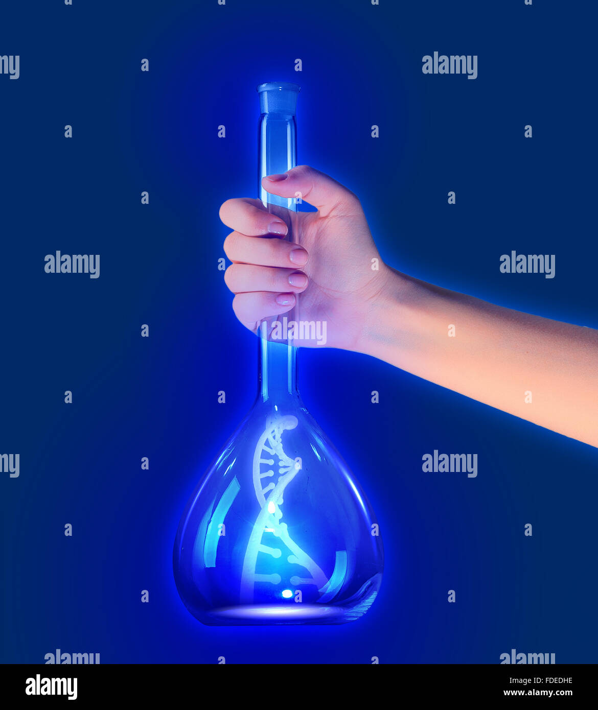 Close up of human hand holding tube with DNA molecule Stock Photo - Alamy