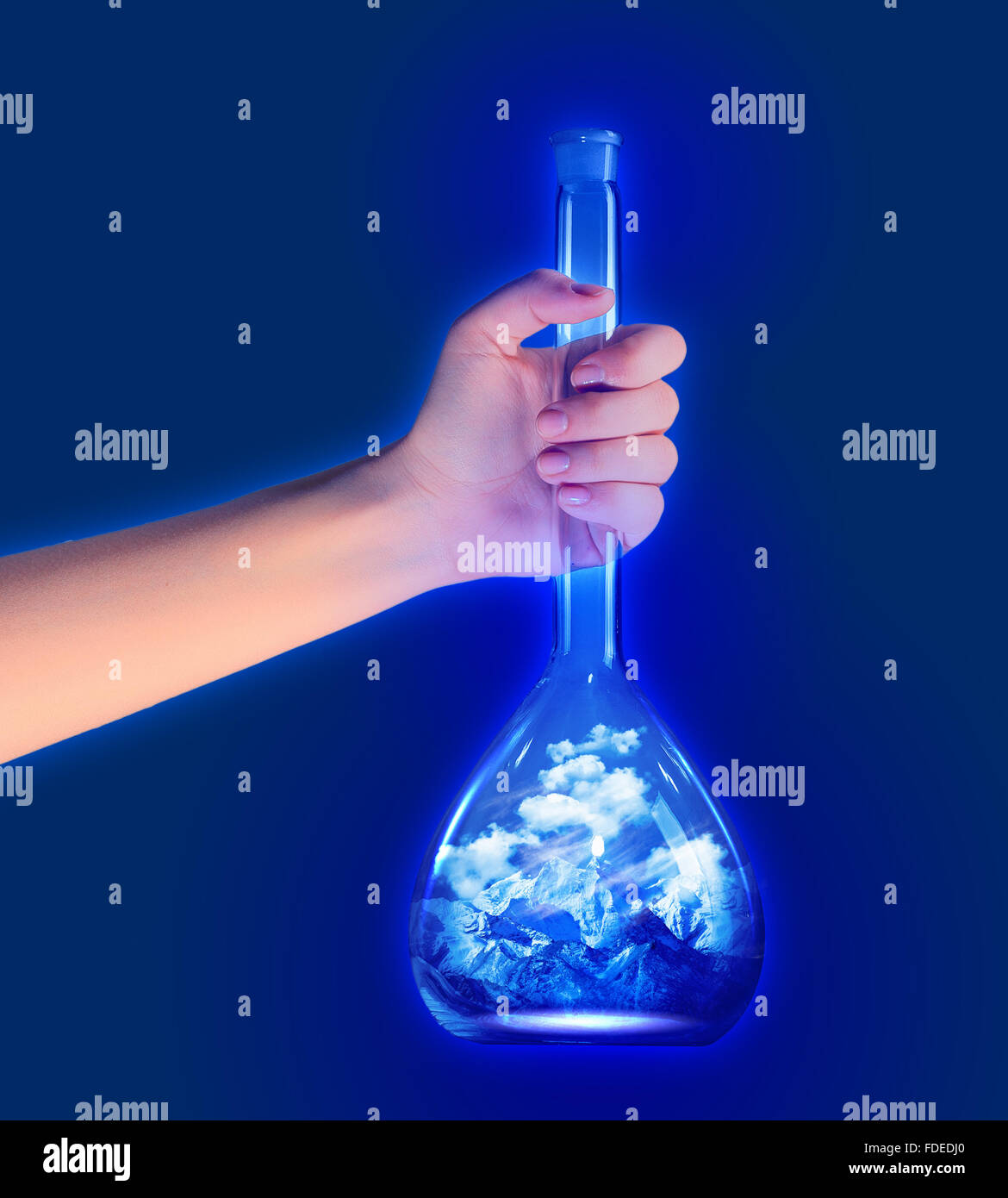 Close up image of human hand with test tube Stock Photo - Alamy