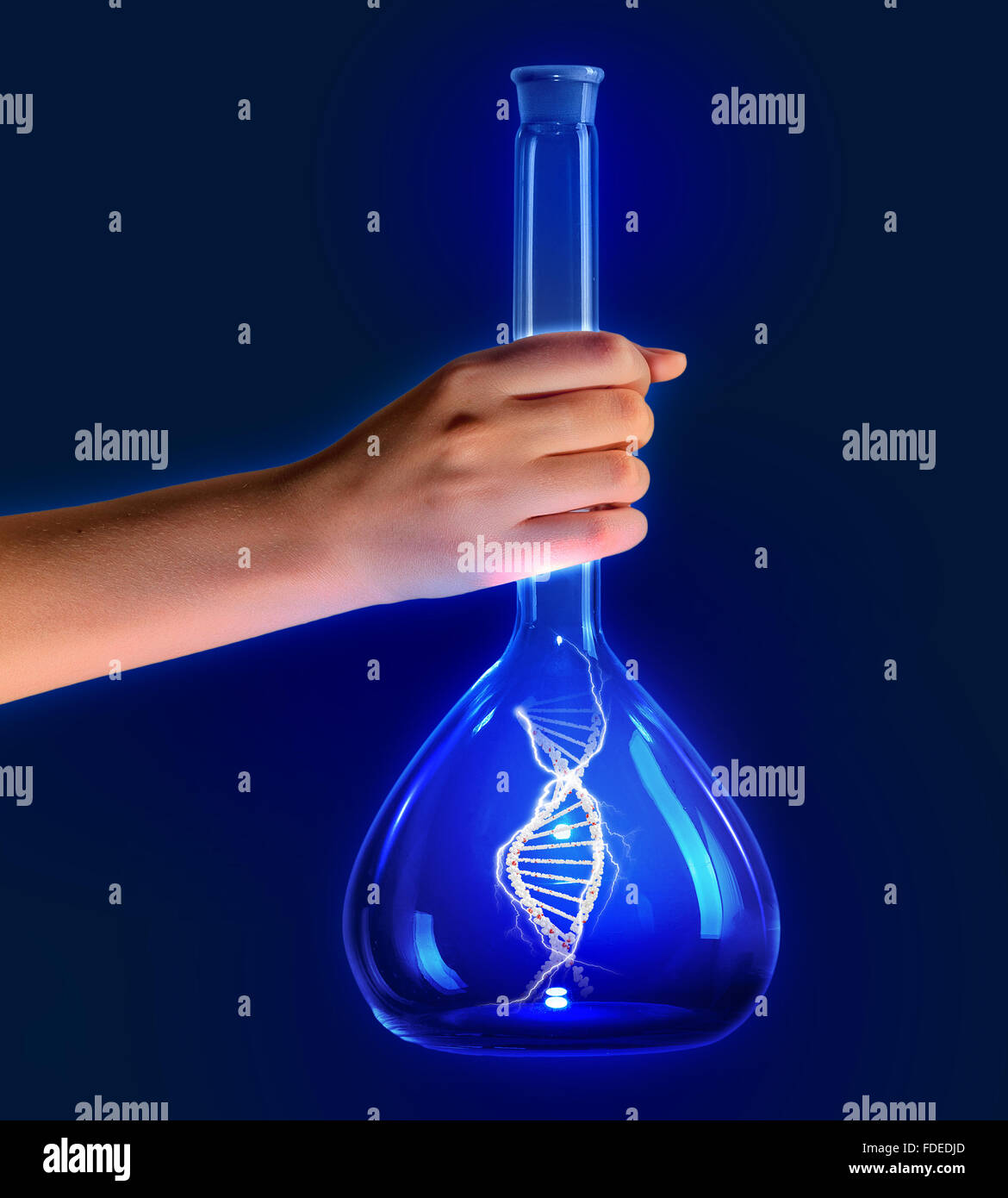 Close up of human hand holding tube with DNA molecule Stock Photo - Alamy