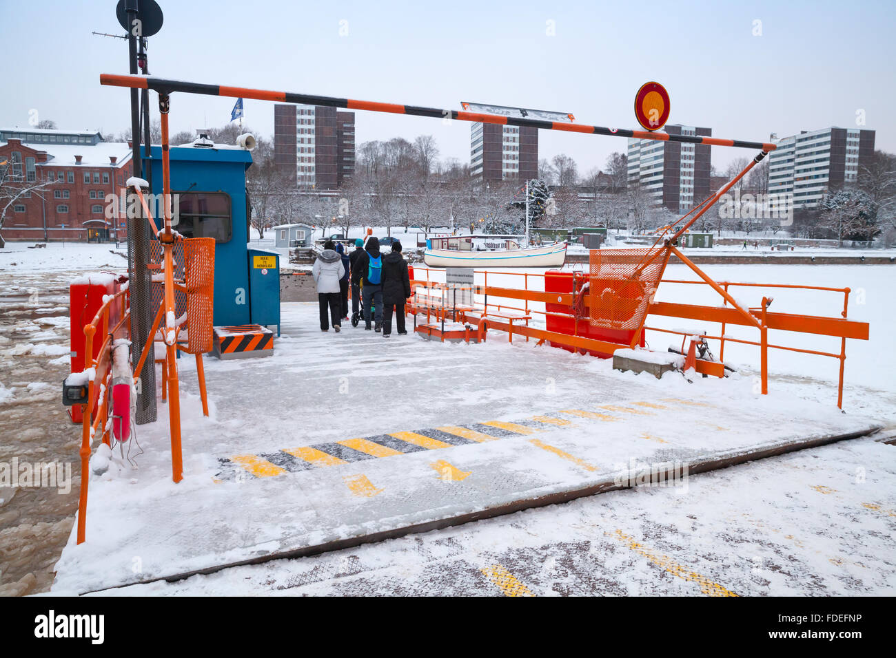 Turku, Finland - January 17, 2016: Ordinary passengers loading on city boat Fori, light traffic ferry Stock Photo