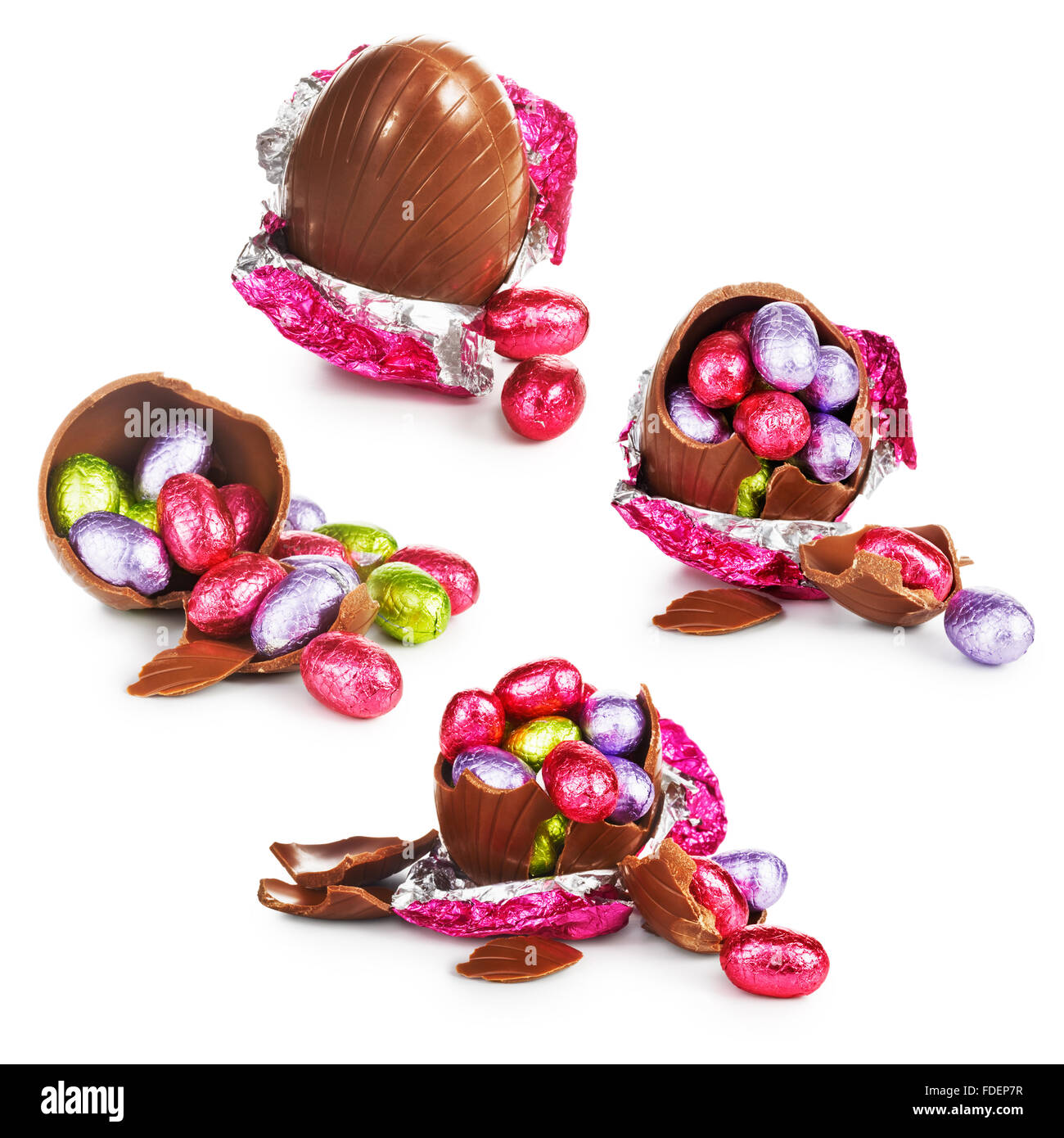Broken chocolate easter egg with colorful candies collection isolated on white background Stock