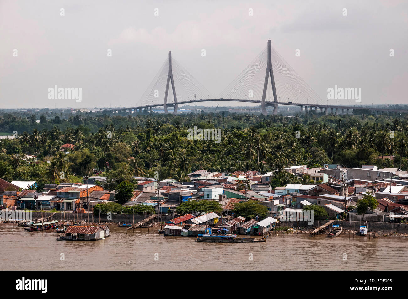 Viet Nam. Vietnam. East Asia. Can Tho  Bridge is a cable-stayed bridge over the Hau River, the largest tributary of the Mekong Stock Photo