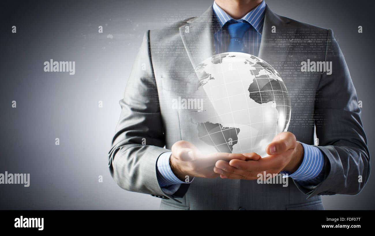Close up of businessman holding digital globe in palm Stock Photo - Alamy