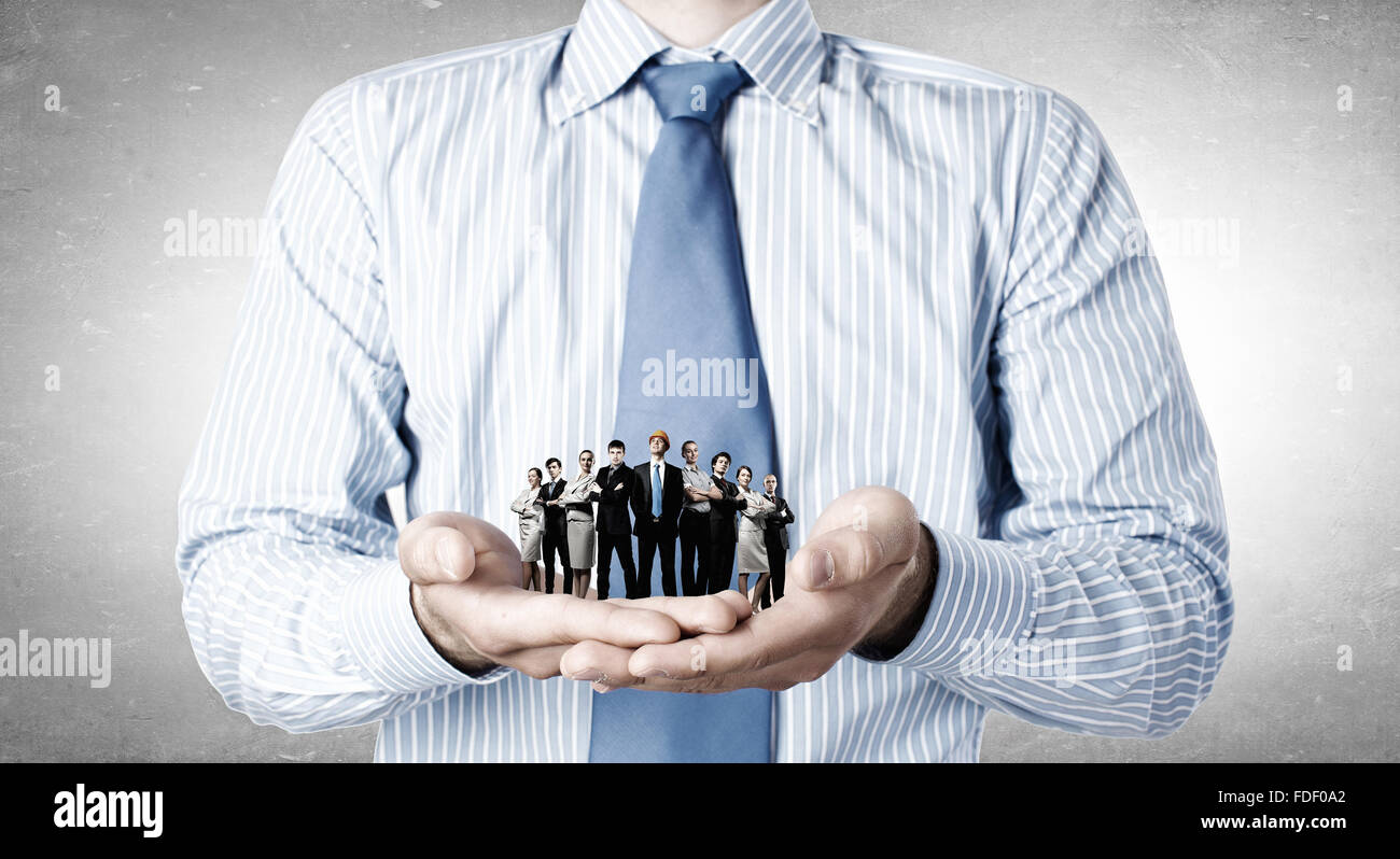 Close up of businessman holding in hands successful business team Stock ...