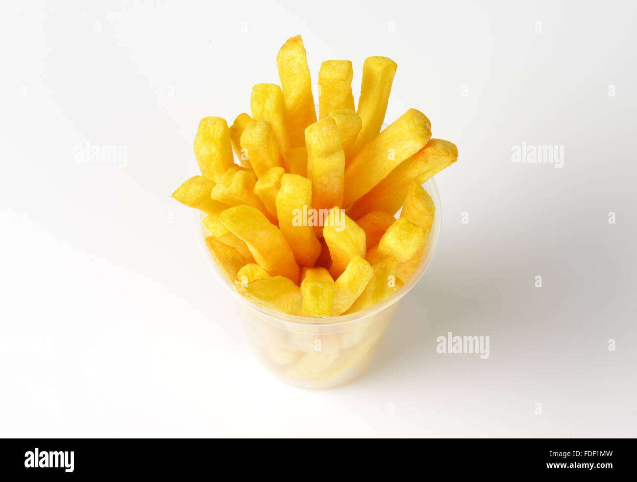 plastic cup of french fries on white background Stock Photo