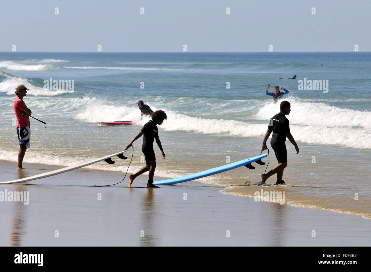 Surfers. Biscarrosse plage,  Landes department, Aquitaine region, southwestern France. Stock Photo