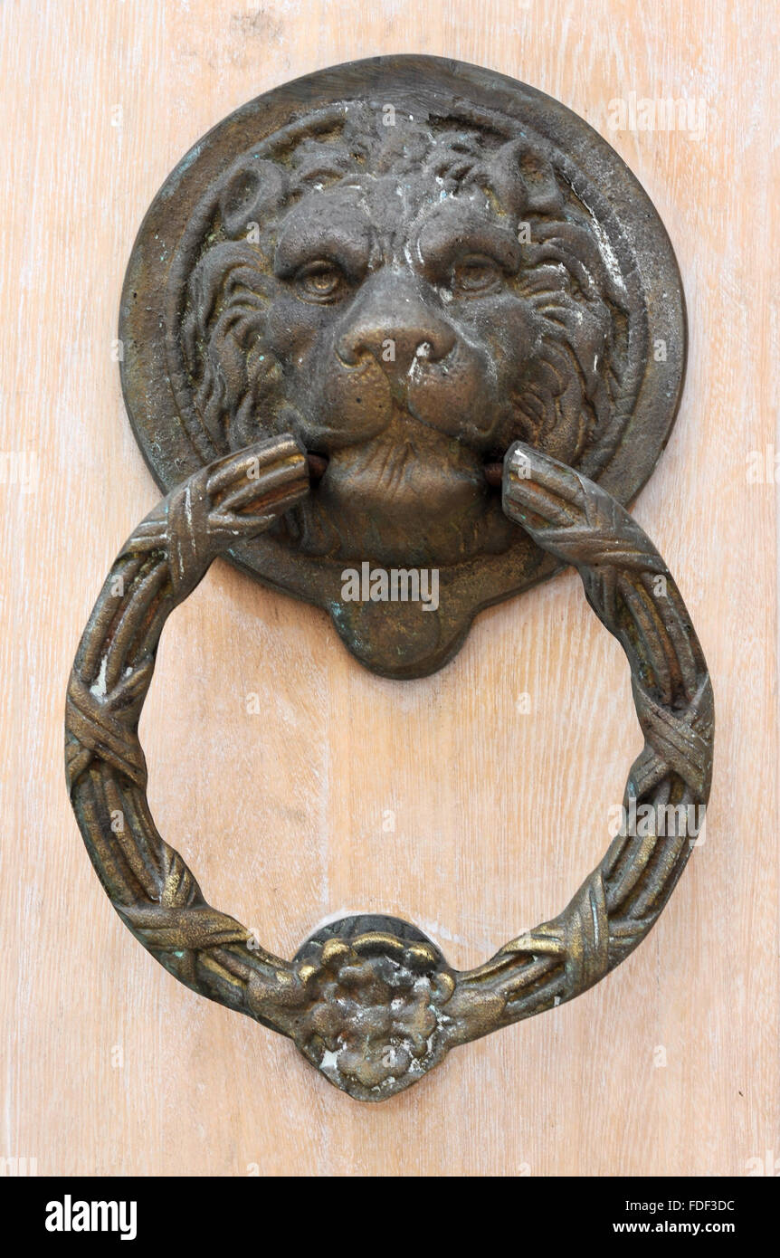 The lion's head as a doorknocker Stock Photo