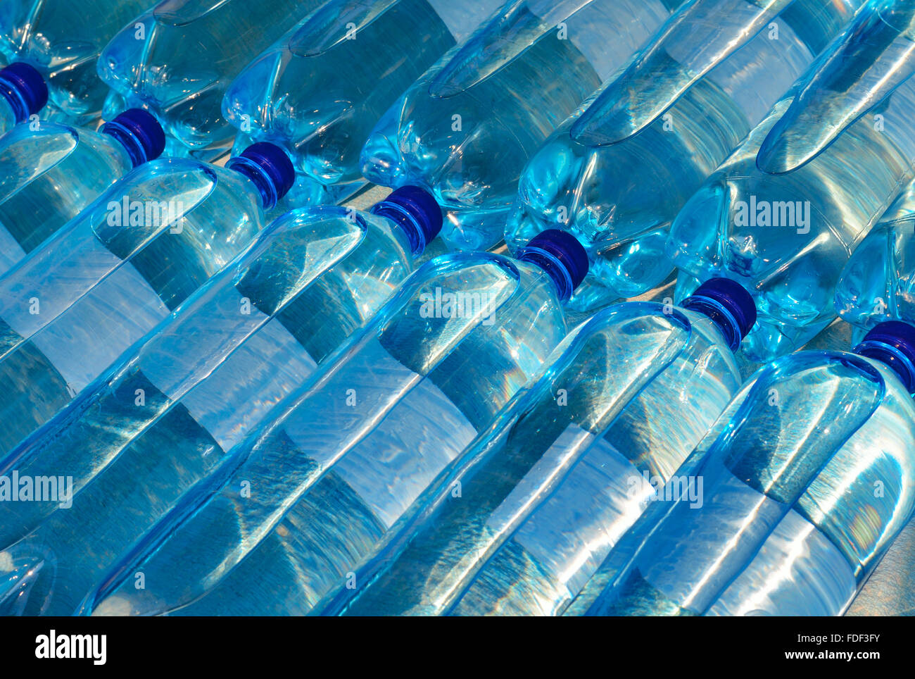 Plastic bottles with carbonated mineral water. Soda Bottles Stock Photo