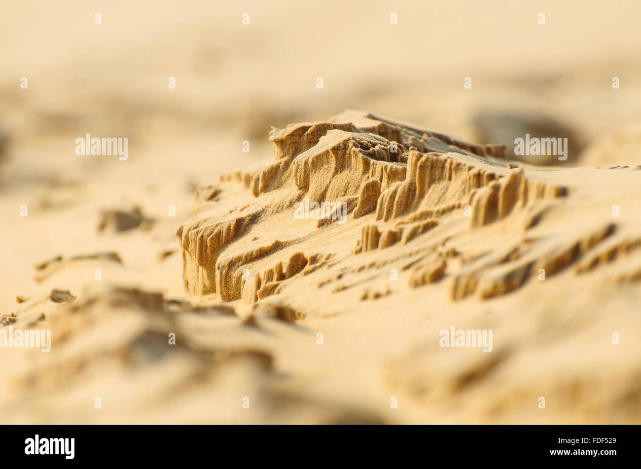 Miniature sand mountain relief. Stock Photo