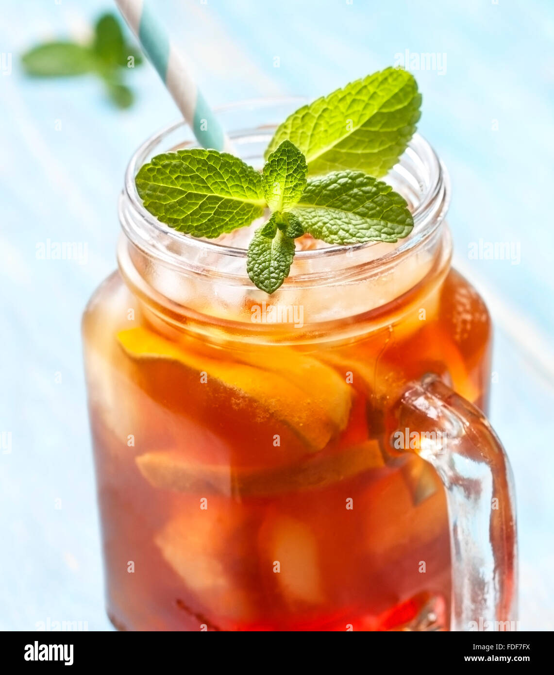ice tea with mint and lemon in Mason jar Stock Photo