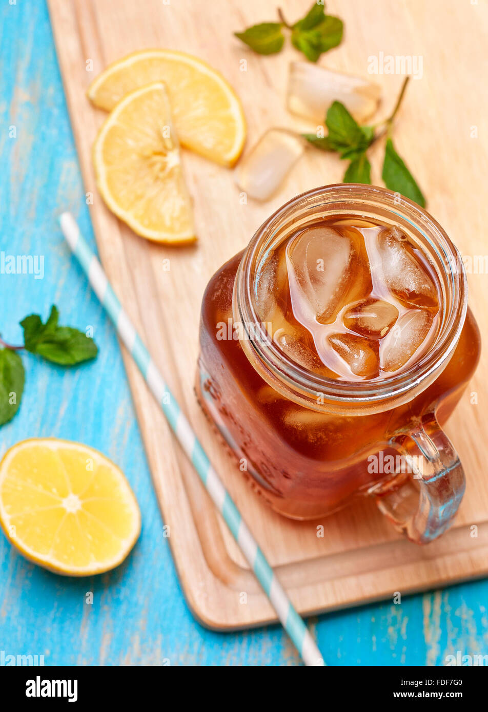 ice tea with mint and lemon in Mason jar Stock Photo