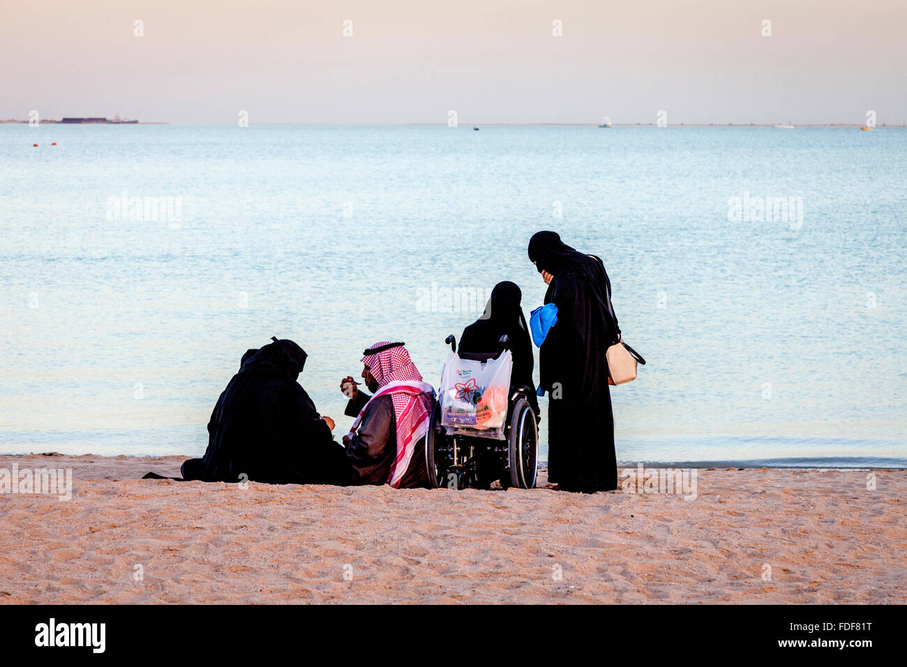 Local People On The Beach At The Katara Cultural Village, Doha, Qatar Stock Photo