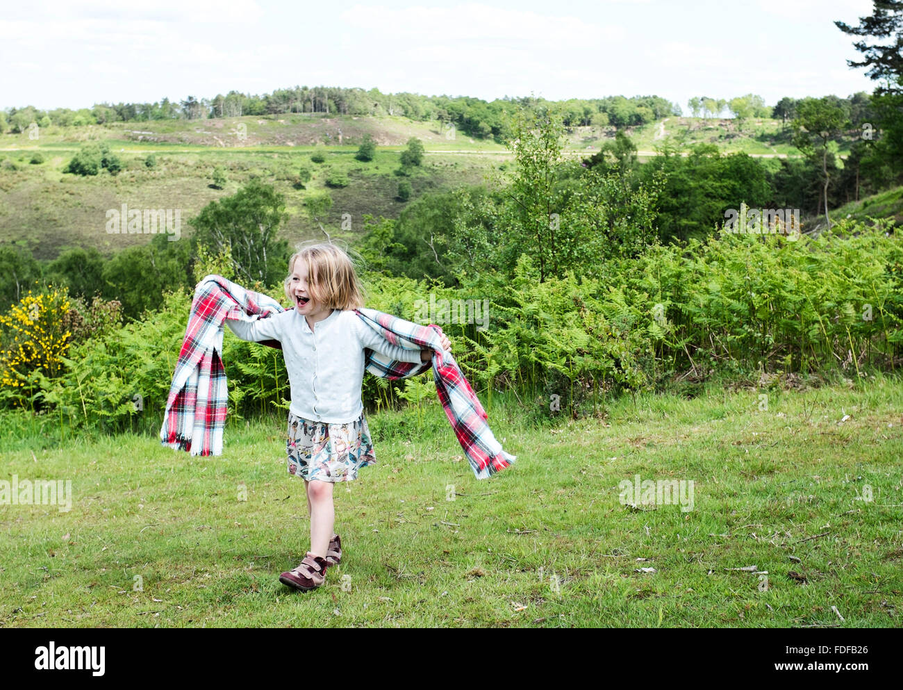 Girl on hill top hi-res stock photography and images - Alamy