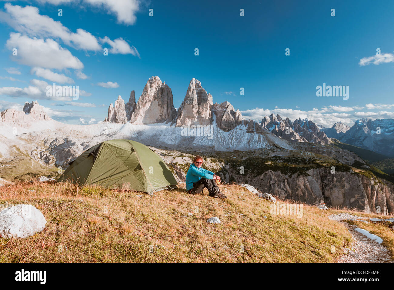 sportsman in high mountains camping Stock Photo