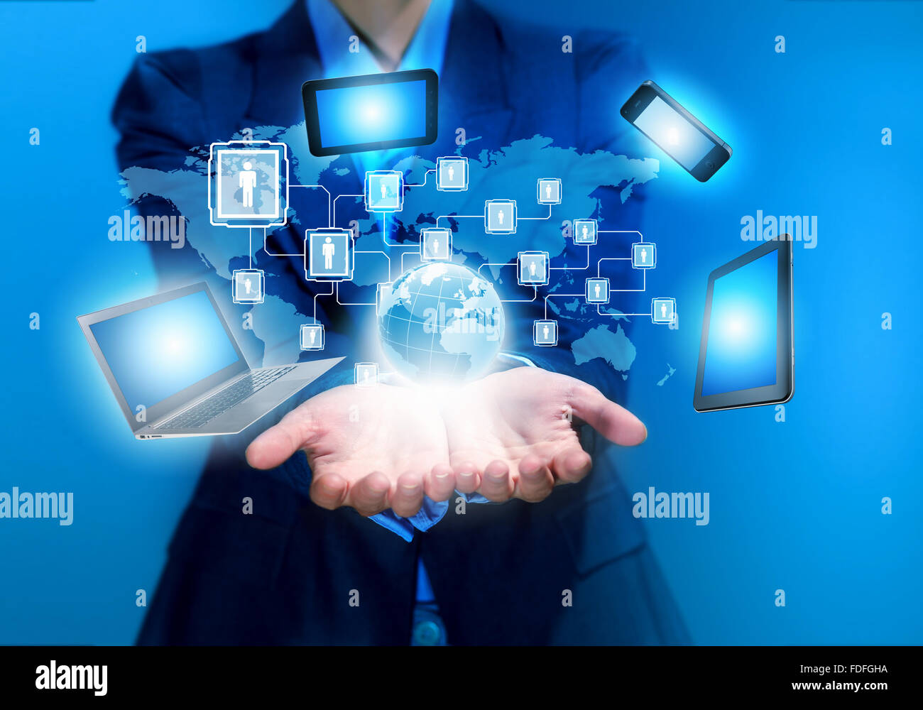 Image of business person holding devices in hands Stock Photo Alamy